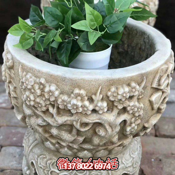 精美藝術石雕花盆，讓繁復多彩的花紋與浮雕結(jié)合，打造出精美的大理石雕塑
