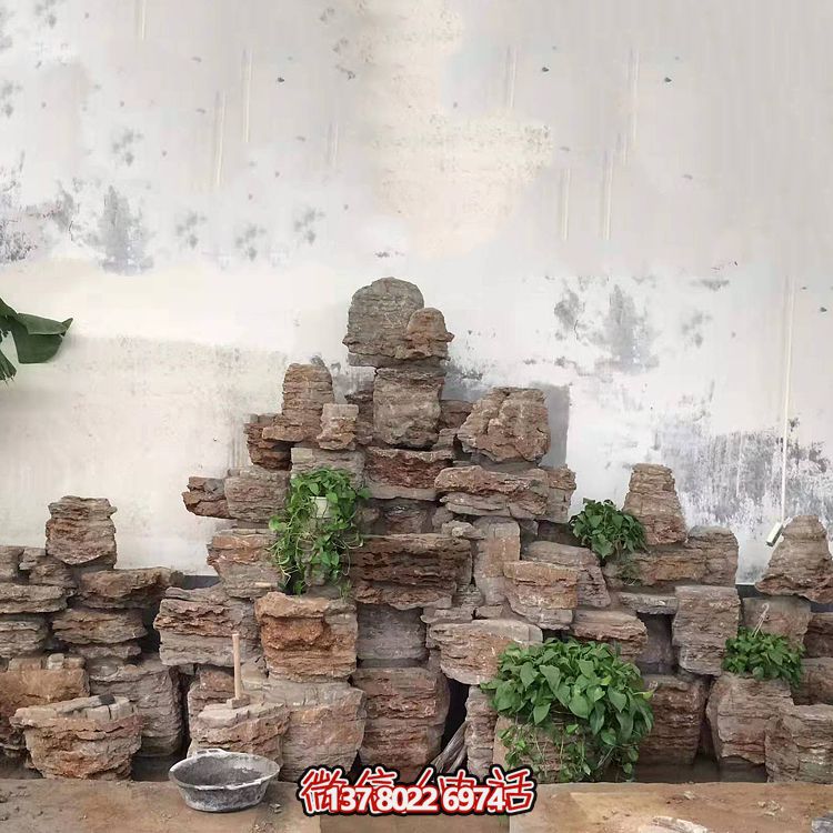 室內(nèi)景觀設(shè)計，精美石雕塑擺放奇石假山